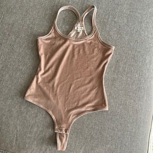 Light pink velvet bodysuit. Madewell, size small.